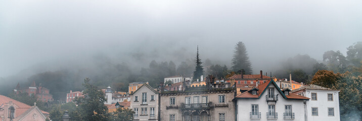 Sintra buildings surrounded by fog, Portugal