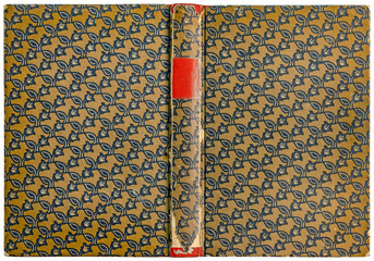 Antique open book cover with floral pattern and empty label on damaged spine - circa 1909