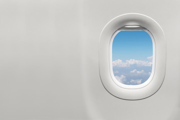 Isolated airplane window with blue sky - Powered by Adobe