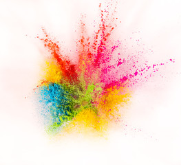 Colored powder explosion isolated on white background.