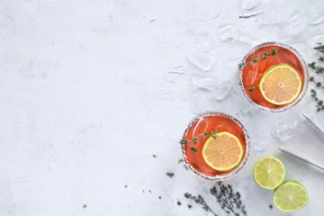 Refreshing lemonade with blood orange, thyme, lime and ice.Cocktail with sicilian orange.Blood...