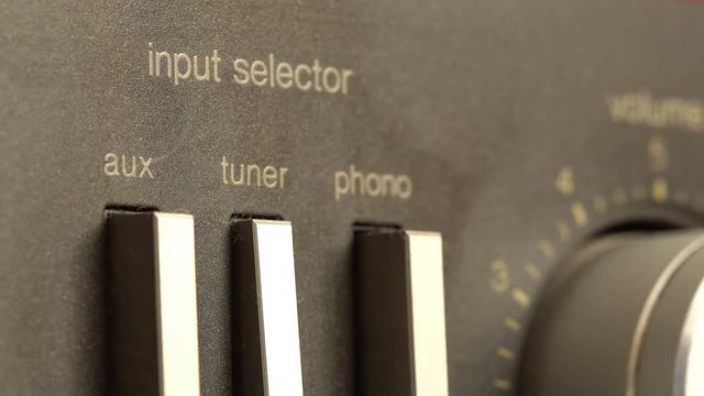Switching between AUX, tuner and phono inputs on a vintage HI-FI stereo receiver
