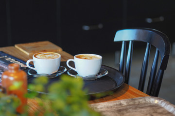 Picture of cafe interior with plates and coffee mugs