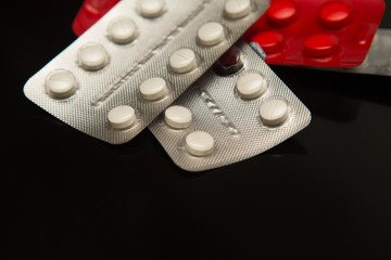 Different medicines. Tablets, pills in blister pack. Medications drugs, flat lay, overhead