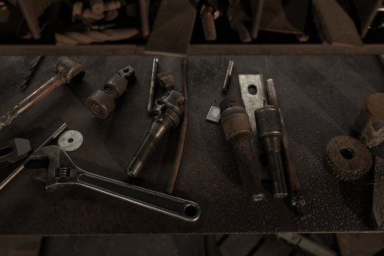 Blacksmith tool arrangement in workshop 