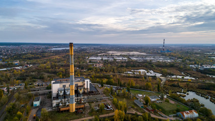 Garbage incineration plant. Waste incinerator plant with smoking smokestack. The problem of environmental pollution by factories.