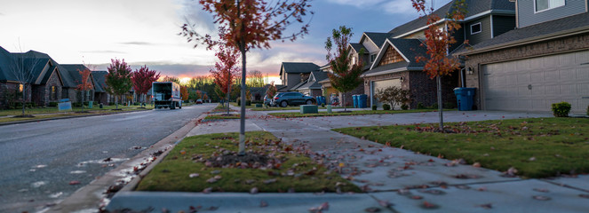 Residential Housing Neighborhood Street at Sunset in Bentonville Arkansas during Fall Season