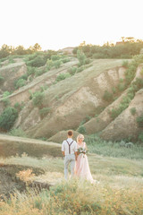 wedding couple on the nature in summer day.