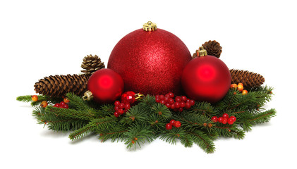Christmas decoration: red balls with cones and fir tree branches