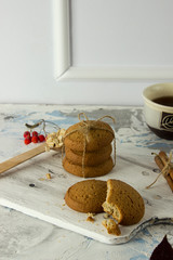 oatmeal cookies on the background of a granite table and a white wall