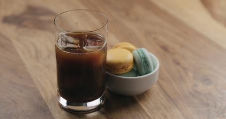 macarons next to coffee