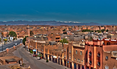 View over Ouarzazate with the snowed Great Atlas in the distance