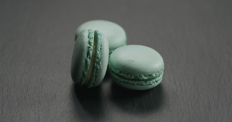 light blue macarons on slate board