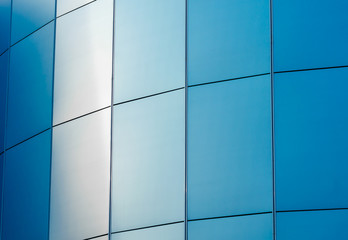 wall of the building with blue panels