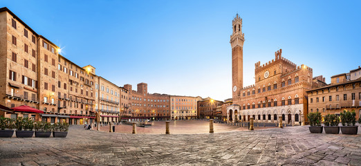 Panorama of Siena, Italy. Piazza del Campo square with gothic town hall building and tower