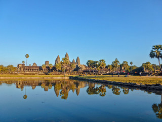 Fototapeta na wymiar Background of Angkor Wat with blue sky in summer, Cambodia