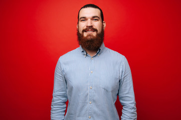 Portrait of bearded hipster man in casual looking at the camera