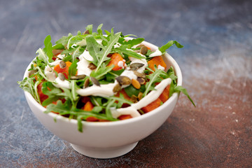 garden with pumpkin and arugula