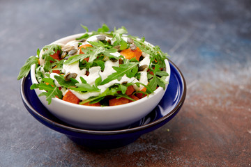 garden with pumpkin and arugula