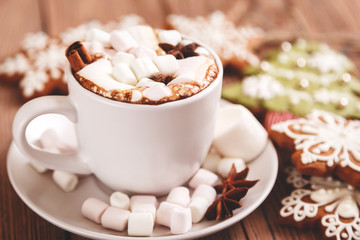 Christmas or new year background. A Cup of festive hot chocolate or cocoa with marshmallows and...