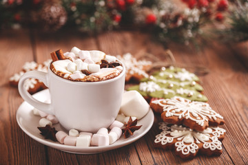 Christmas or new year background. A Cup of festive hot chocolate or cocoa with marshmallows and...