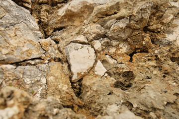 Fototapeta premium brown color natural marble with royal feel texture. cracks in the rocks on the shore