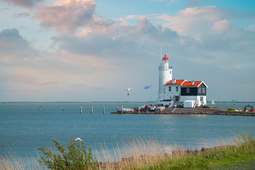 Fototapeta Lighthouse in the Dutch old village obraz