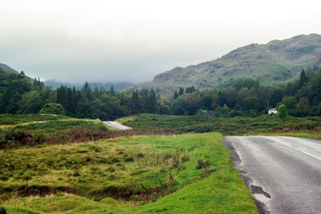 Fototapeta na wymiar Road through the fells near Elterwater in the Lake District.