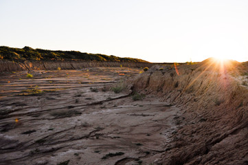 sunset on coast of sea