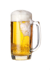 Close up one frothy beer glass isolated on white