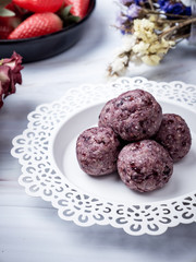 Healthy organic date energy balls with berry, dried fruits and nuts. Food for healthy lifestyle.