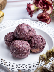 Healthy organic date energy balls with berry, dried fruits and nuts. Food for healthy lifestyle.