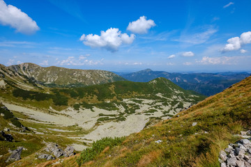 Fototapeta na wymiar rocky mountain tops with hiking trails in autumn in Slovakian Tatra western Carpathian