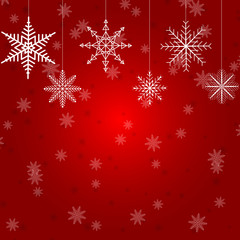 Christmas illustration with several hanging snowflakes on red background