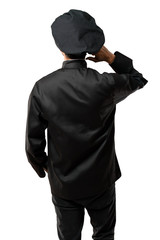 Chef man In black uniform on back position looking back while scratching head on isolated white background