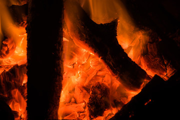 Closeup of Campfire ablaze at night - 231739020