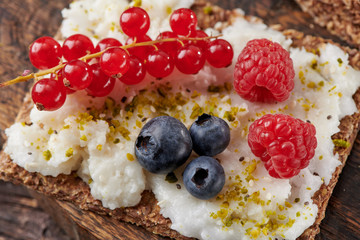 Sandwich with nuts and berrie Useful breakfast.
