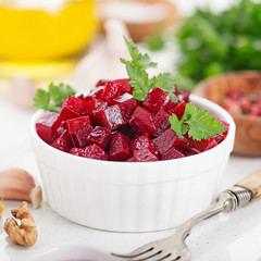 Healthy vegan beetroot salad with walnuts.