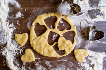 Cooking homemade cookies. the rolled out dough with a cookie cutter