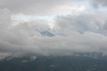Naklejka na ściany i meble Cloudy View of Himalayan Mountain in Khaliya Top, Munsyari, Uttarakhand, India
