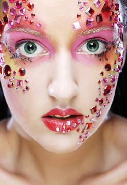 Closeup portrait of woman with artistic make-up