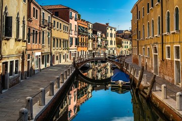 Fototapeta na wymiar Italy beauty, bridge over canal street in Venice, Venezia