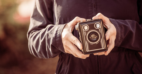 Girl with vintage camera