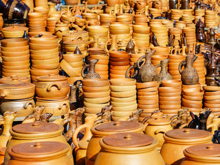 traditional Georgian handmade clay pottery on display at street market