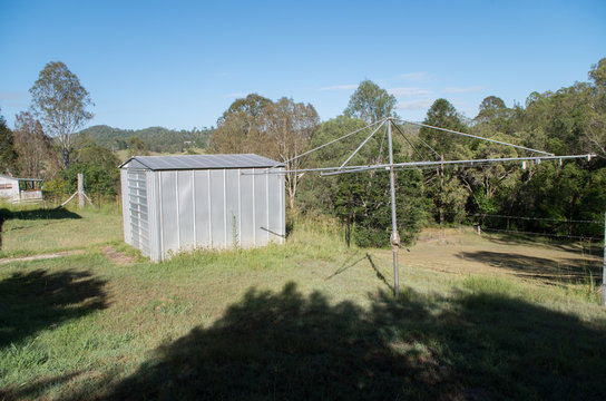 Australian tin shed and rotary clothes washing line