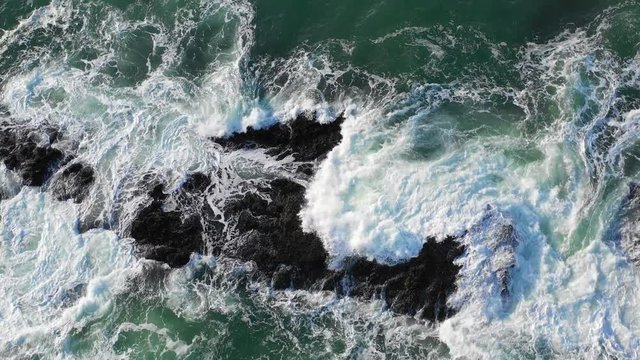 Aerial of Pacific Ocean Washing Over Rocks in Northern California