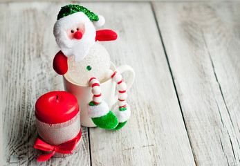 Christmas decor, snowman in the cup, New Year or Christmas concept, cafe banner