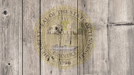 USA Politics News Concept: US State Tennessee Seal Wooden Fence Background