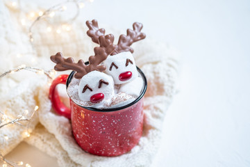 Hot chocolate with melted marshmallow snowman
