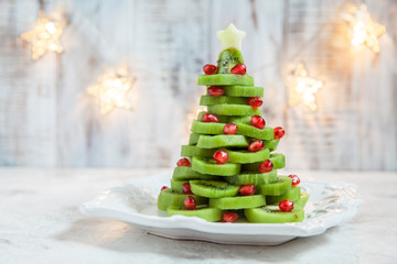 Kiwi pomegranate Christmas tree, beautiful New Year background
